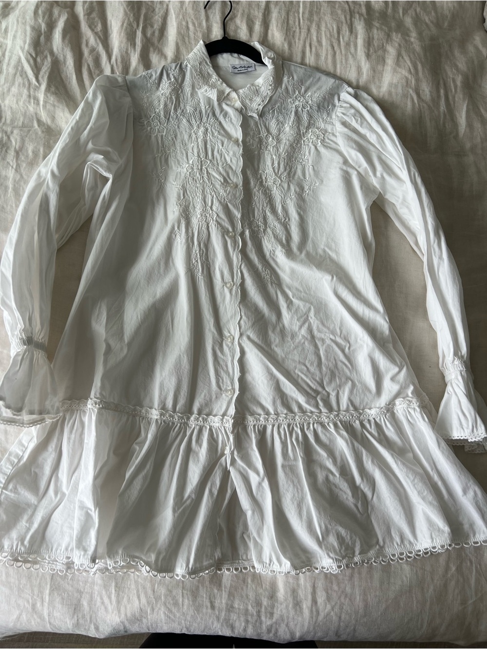 Dainty white dress with floral embroidery